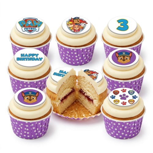 Paw Patrol themed cupcakes with white frosting, purple polka dot wrappers, and various character and logo toppers, including a custom age '3' topper and 'Happy Birthday' message.