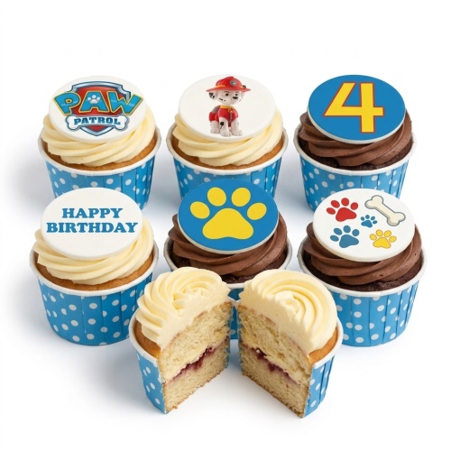 Paw Patrol themed birthday cupcakes with Marshall, logo, paw prints, and 'Happy Birthday' message.