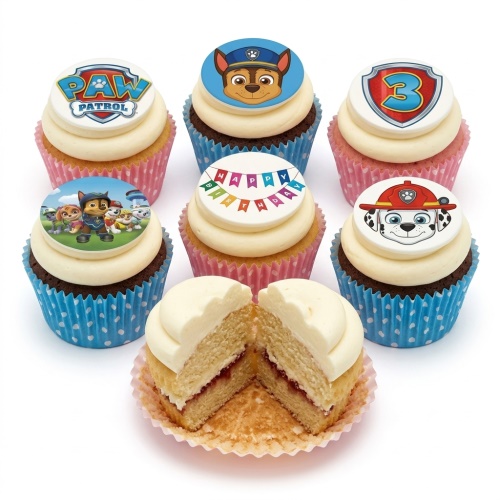 Paw Patrol themed cupcakes with Chase and Marshall toppers and a "Happy Birthday" banner.