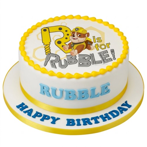 Round white cake with yellow trim, featuring Paw Patrol character Rubble and "R is for RUBBLE!".