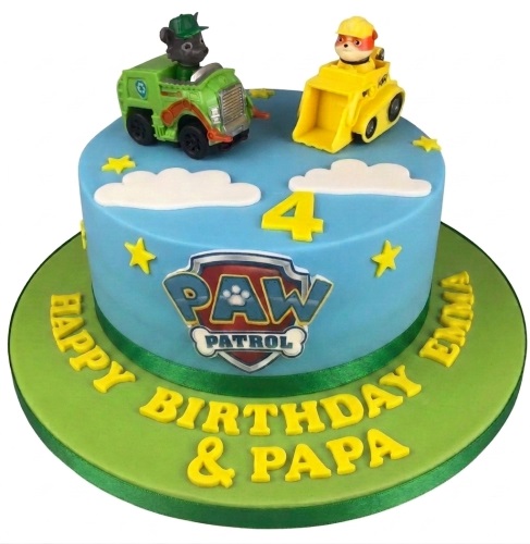 Round blue Paw Patrol birthday cake with Rocky and Rubble toppers, custom age, and personalised message.