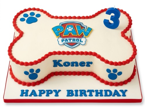 Bone-shaped Paw Patrol birthday cake with blue paw prints, red piping, and a custom age candle.