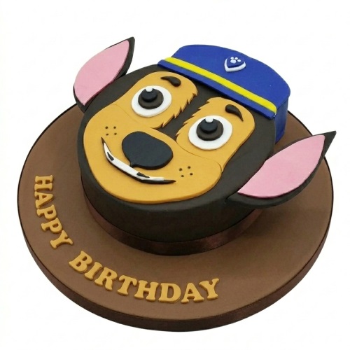 Paw Patrol Chase character birthday cake with a blue hat and 'Happy Birthday' message on the brown cake board.