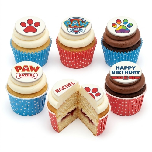 Six Paw Patrol themed cupcakes with white and chocolate frosting, paw print toppers, and 'Happy Birthday' and 'Rachel' messages.