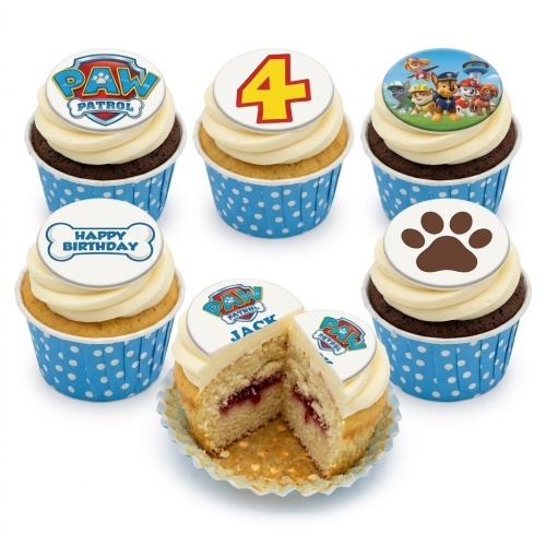 Set of Paw Patrol themed cupcakes with white icing, blue polka dot wrappers, featuring Paw Patrol logo, characters, a paw print, a 'Happy Birthday' bone, and a custom age '4' topper.