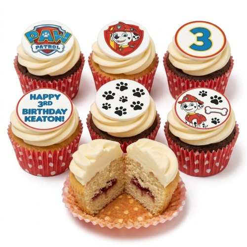 Paw Patrol Marshall themed cupcakes with logo, paw prints, and custom age topper.
