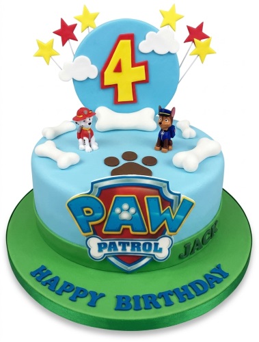 Paw Patrol themed birthday cake with Marshall and Chase figurines, edible bones, and a custom age topper.