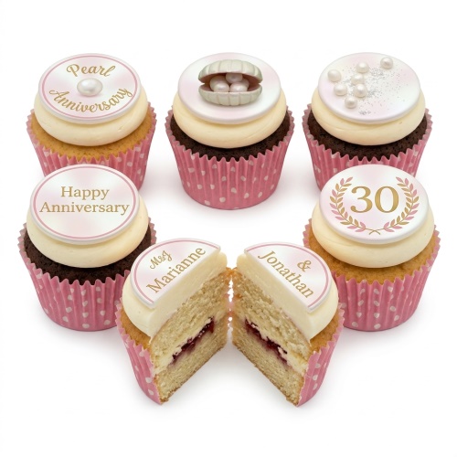 Set of six anniversary cupcakes with pearl decorations, glitter, and customisable toppers.