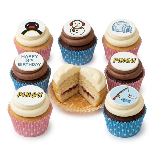 Assortment of Pingu themed cupcakes with Pingu, snowman, igloo, and fishing toppers.