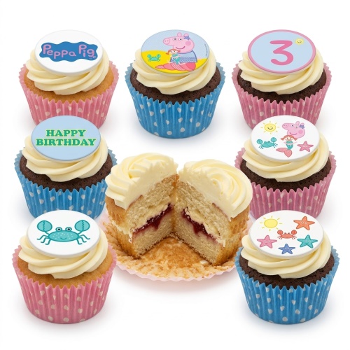 Peppa Pig themed birthday cupcakes with mermaid, crab, and sun toppers for a child's party.