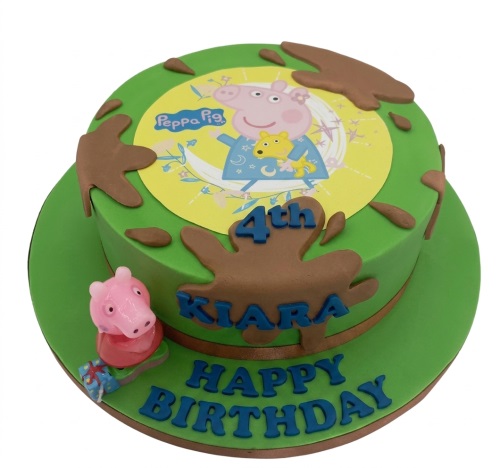 Green Peppa Pig birthday cake with mud splatters, custom age topper, and personalised name.