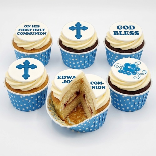 Blue and white First Holy Communion cupcakes with cross and floral toppers.