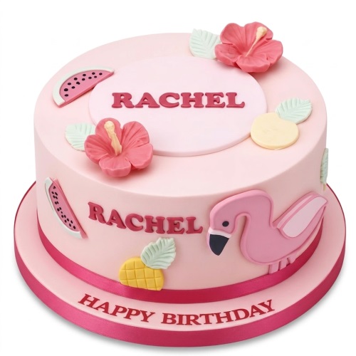 Pink round cake with flamingo, hibiscus flowers, watermelon, and pineapple decorations.