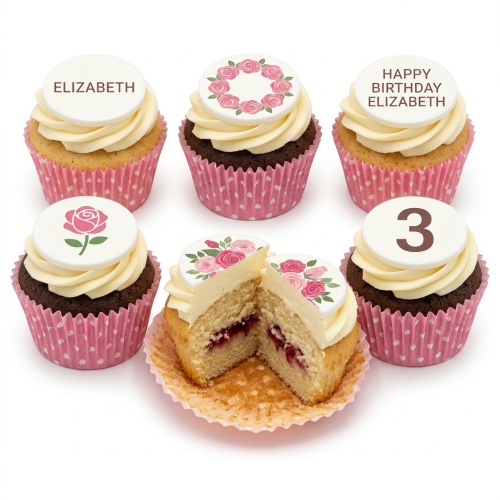 Vanilla and chocolate cupcakes with white frosting, pink rose toppers, and a custom age number.