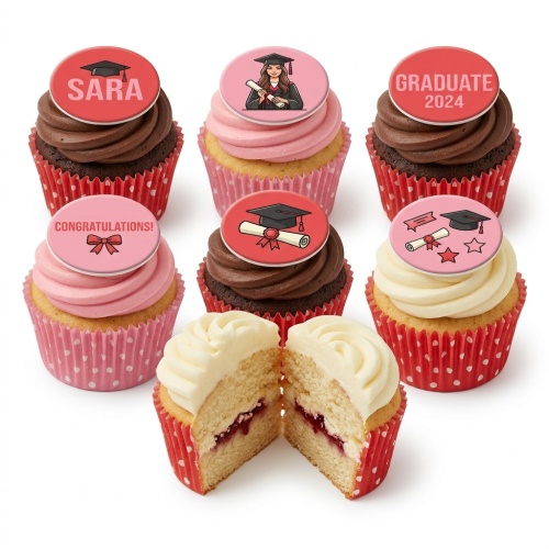 Assortment of graduation themed cupcakes with red and pink toppers, some with graduation caps, scrolls, and celebratory messages.