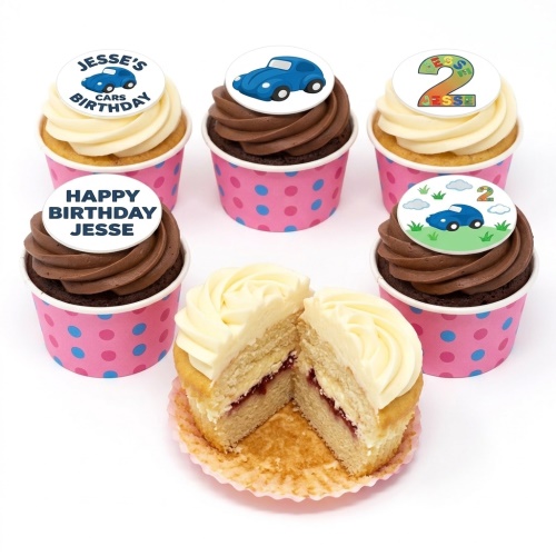 A selection of car themed birthday cupcakes with custom age and personalised message toppers.
