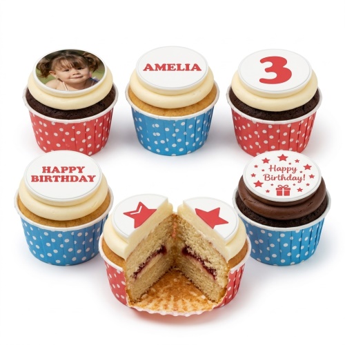 Assortment of personalised birthday cupcakes with photo, name, age, and star toppers in red and blue polka dot cases.