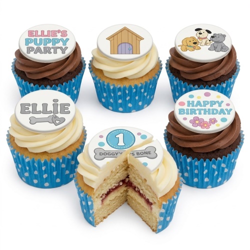 A set of puppy themed birthday cupcakes with dog house, puppies, and bone toppers in blue wrappers.