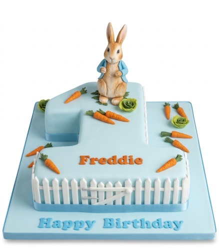 Peter Rabbit 1st birthday cake in light blue with carrots and a picket fence.