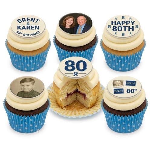 A selection of 80th birthday cupcakes with cream frosting and blue polka dot cases, featuring personalised photo toppers and '80th Birthday' messages.