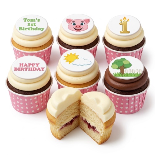 Set of baby birthday cupcakes with pig, sun, tree, and custom age toppers in pink polka dot cases.