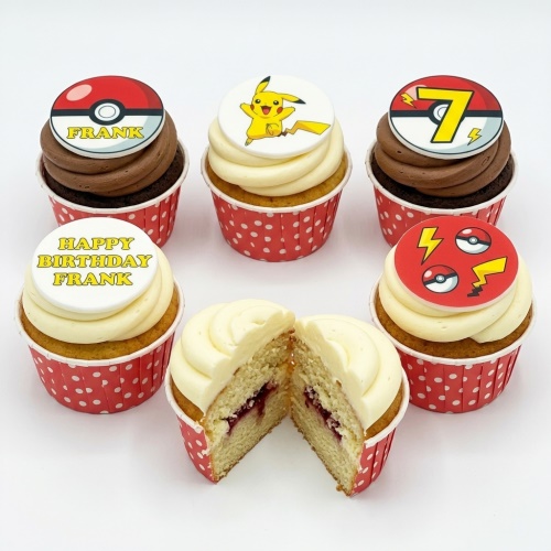 Six Pokémon themed cupcakes with Pikachu, Poké Ball toppers, and custom age/message.