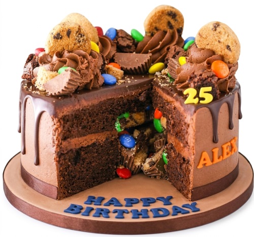 Chocolate drip cake with cookies, M&Ms, and Reese's, featuring a piñata candy filling.