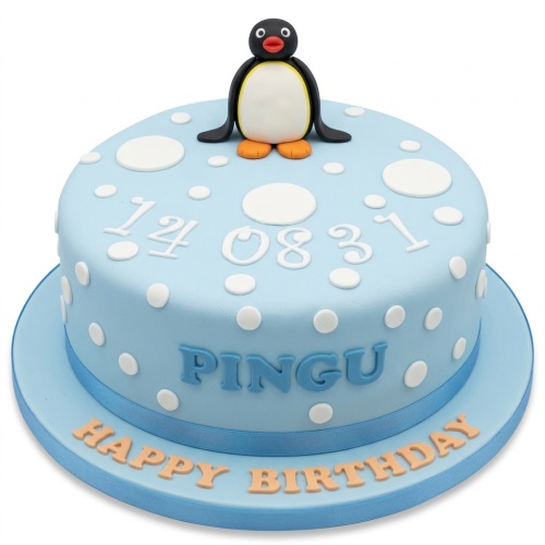 Round blue Pingu birthday cake with white polka dots and a Pingu figurine topper.