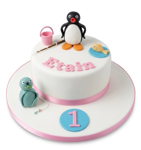 White Pingu themed birthday cake with baby penguin, fishing rod, fish, and custom age topper.
