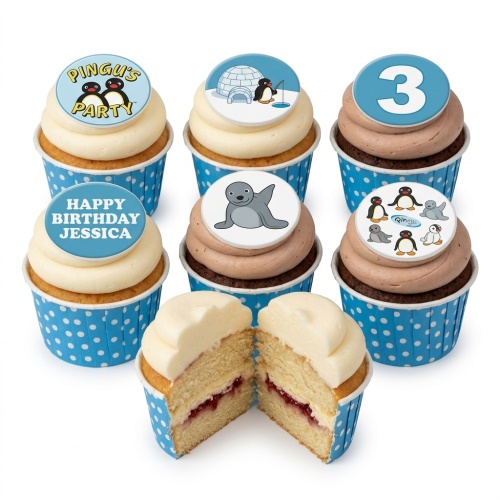 Pingu themed birthday cupcakes with white and chocolate frosting, blue polka dot cases, and custom age topper.