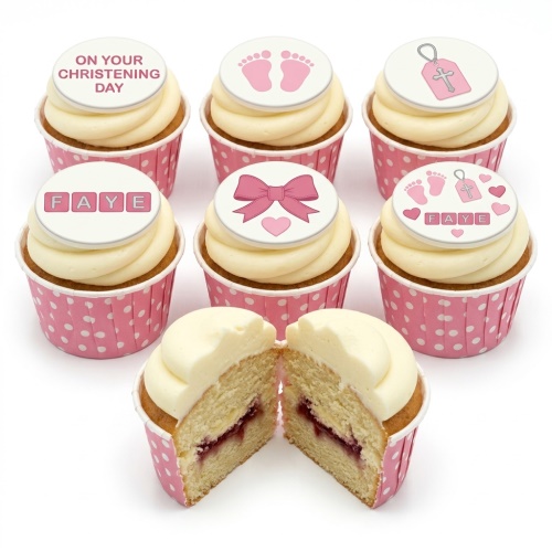 Pink christening cupcakes with baby footprints, bows, cross tag, and "On Your Christening Day" topper.
