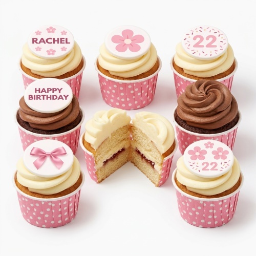 Assortment of pink and white floral birthday cupcakes with custom age and name toppers.
