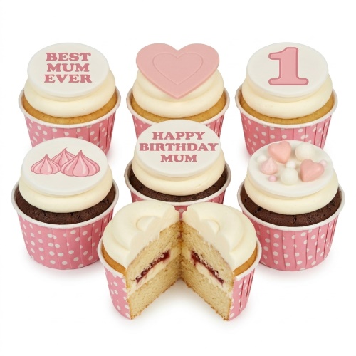 Pink and white cupcakes with heart toppers, meringues, and custom message toppers
