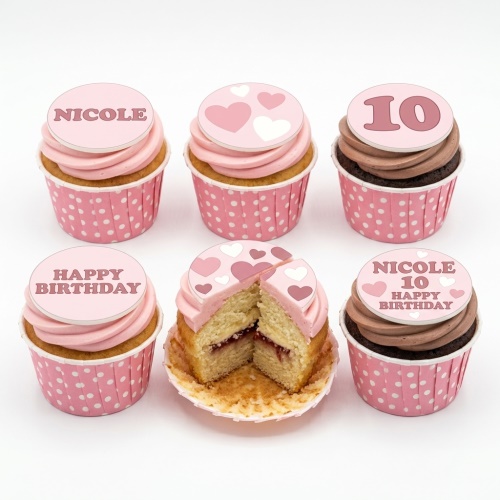 Pink and chocolate cupcakes with heart toppers, custom age, and personalised birthday message.