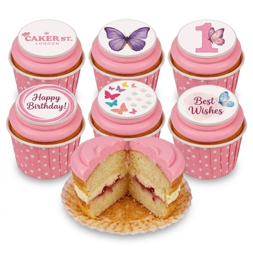 Pink cupcakes with various butterfly and 'Happy Birthday!' toppers, a custom age '1' topper, and polka dot cases.