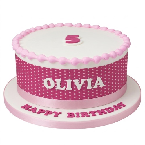 Round pink polka dot birthday cake with white top, pink beaded border, and custom age topper.