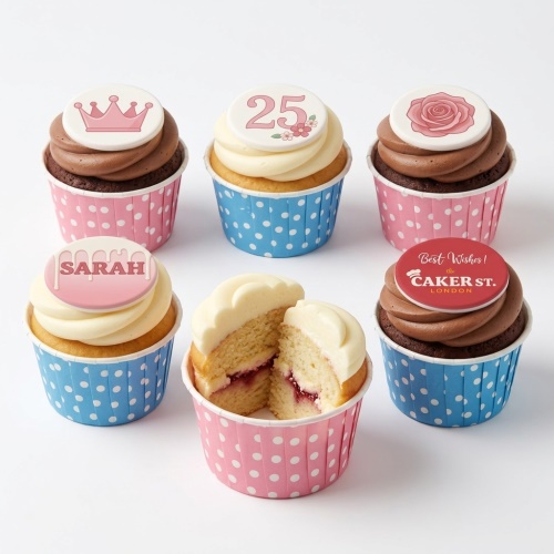 Assortment of floral and crown birthday cupcakes with custom age and name toppers.