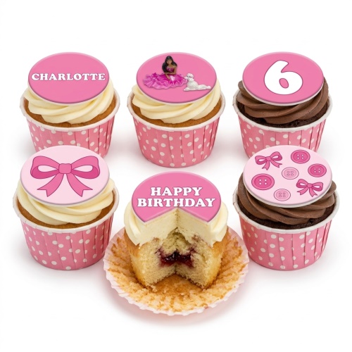 Pink birthday cupcakes with princess doll, bow, buttons, and custom age toppers in polka dot wrappers.