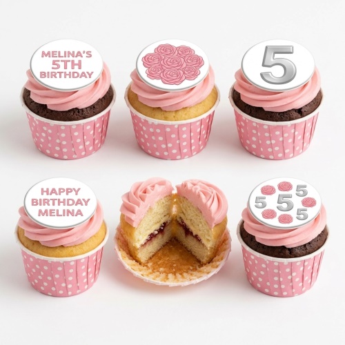 Pink rose swirl birthday cupcakes with custom age and personalised message toppers in polka dot wrappers.