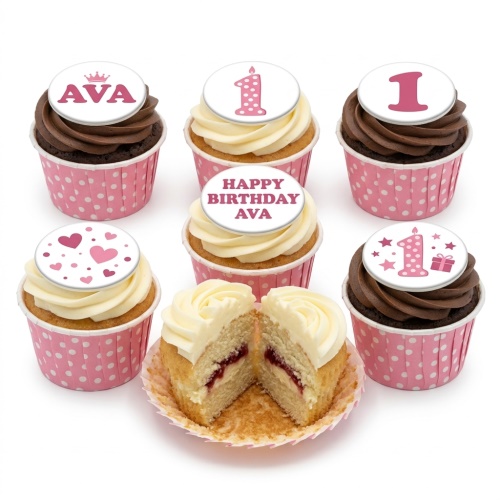 Pink and white 1st birthday cupcakes with number one, hearts, crown, and personalised name toppers.