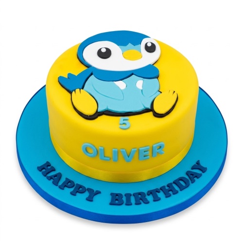 Round yellow and blue Piplup Pokemon birthday cake with custom age and name.