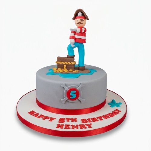 Round grey pirate themed birthday cake with a pirate figure, treasure chest, crossbones, and custom age topper.