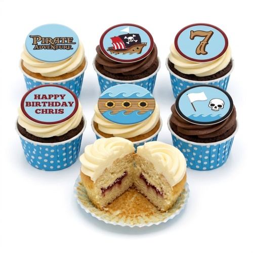 Pirate themed birthday cupcakes with pirate ship, skull, and "Pirate Adventure" toppers, with a custom age and personalised message.