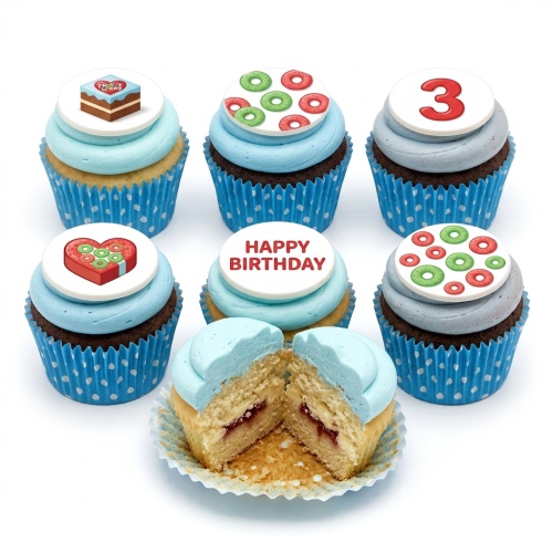 A selection of blue and grey frosted cupcakes with white toppers featuring gift boxes, donut patterns, a red number 3, and "Happy Birthday" text.