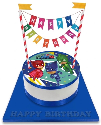 Round single-tier PJ Masks birthday cake with Catboy, Owlette, and Gekko characters, blue ribbon, and 'Happy Birthday' bunting.