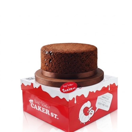 Classic single-tier round chocolate cake with a brown ribbon on a Caker Street box.