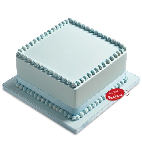 Square blue cake with piped shell borders and a matching ribbon.