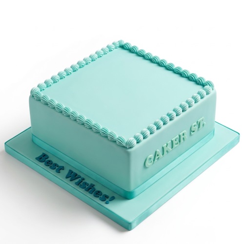 Elegant aqua square cake with piped shell border and "Best Wishes!" message.