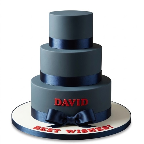 Three-tiered dark grey cake with navy blue satin ribbons and a large bow, featuring custom red text.