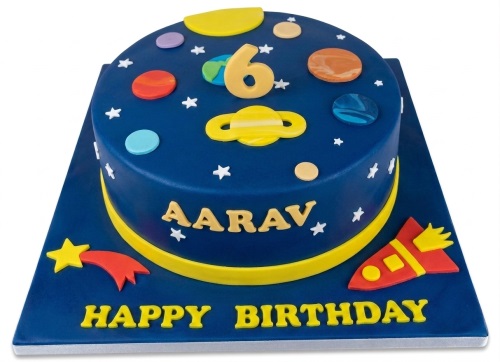 Round blue space theme birthday cake with planets, stars, rocket, and custom age topper.